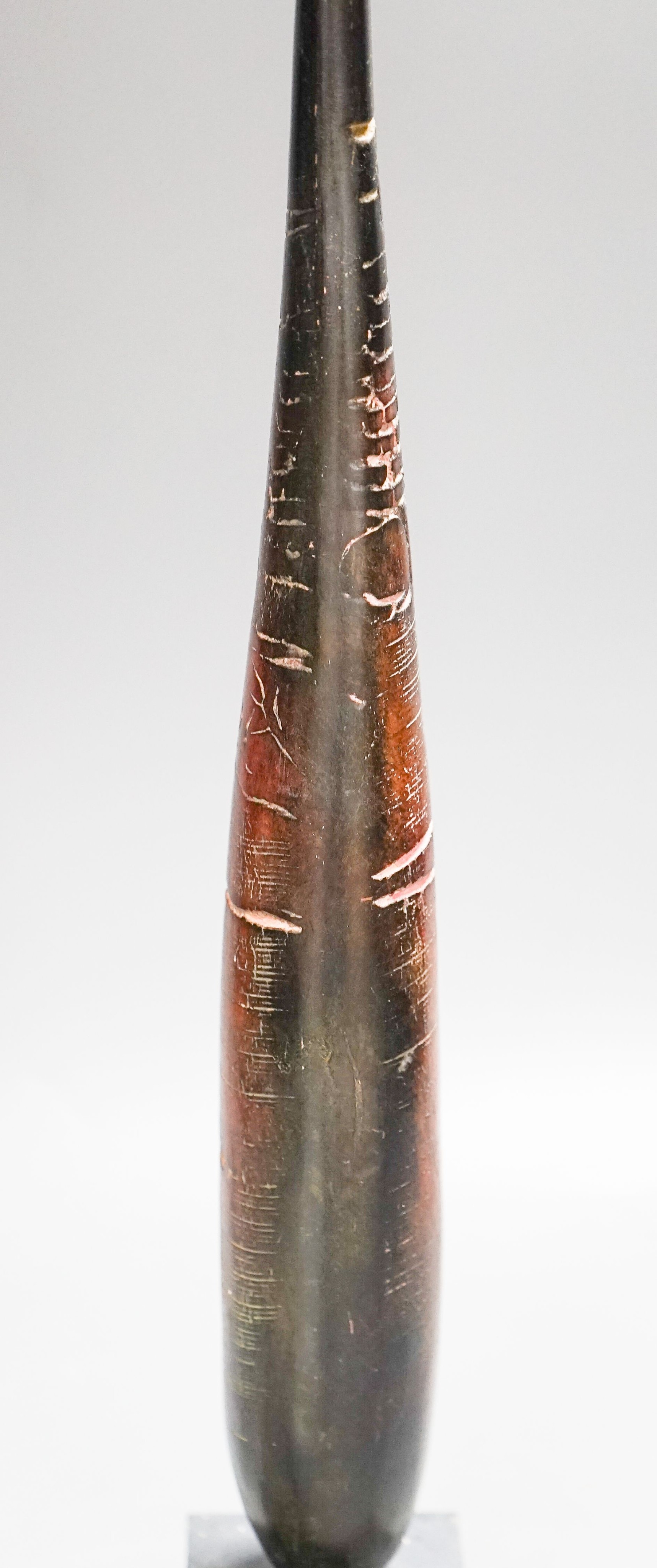 Peter Hayes (b.1946), a brown burnished raku ‘standing stone' sculpture, on a slate plinth 38cm
